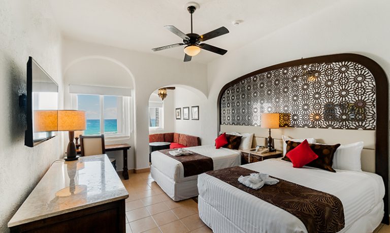Luxury Ocean View Room with two beds, providing stunning ocean vistas and luxurious accommodations for a comfortable stay.