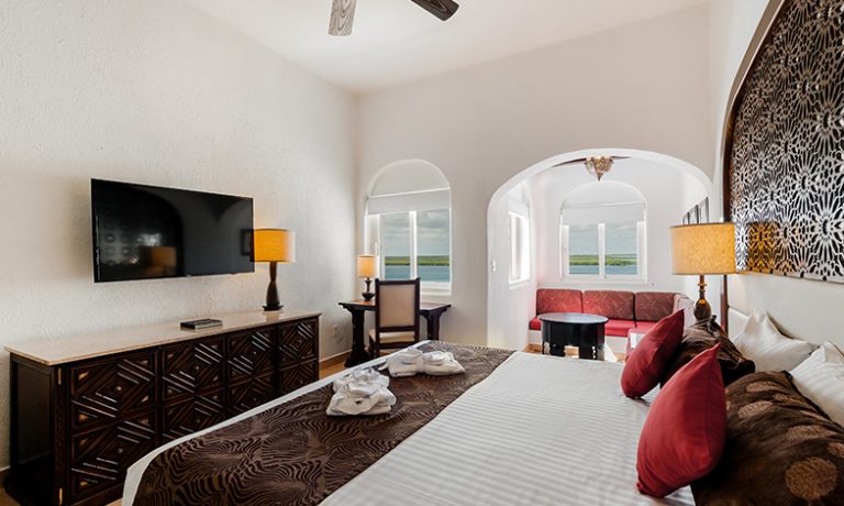 Deluxe Lagoon View Room with one queen-size bed, offering a tranquil retreat with scenic lagoon vistas